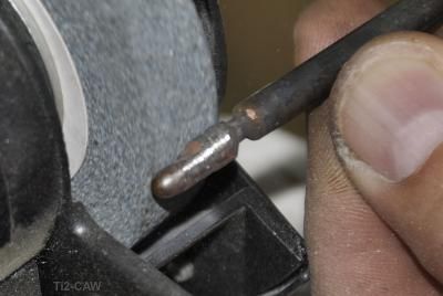 reparando y puliendo punta de cautin